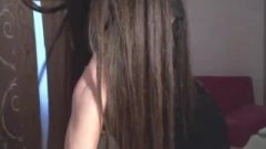 Suggestive Long Hair Camgirl But Her Face Is Hidden